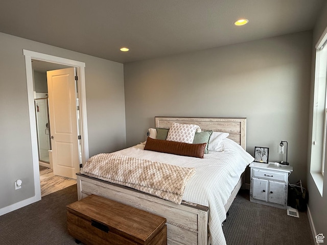 bedroom with recessed lighting, baseboards, and dark carpet