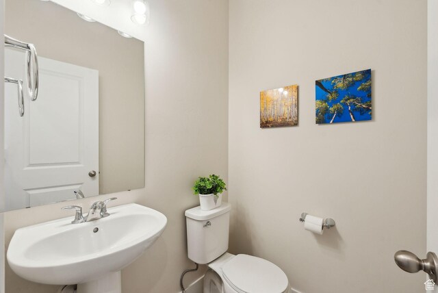 6005 N Westridge Rd, Heber City, UT 84032 - half bathroom with toilet and a sink
