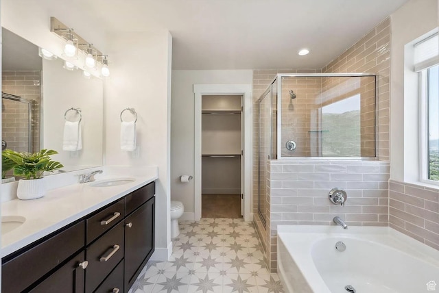 6005 N Westridge Rd, Heber City, UT 84032 - full bathroom with a garden tub, a sink, a stall shower, and tile patterned floors