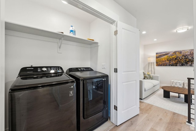 6005 N Westridge Rd, Heber City, UT 84032 - laundry room with washing machine and clothes dryer, light wood finished floors, laundry area, and recessed lighting