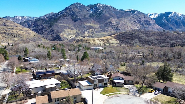 birds eye view of property with a residential view and a mountain view