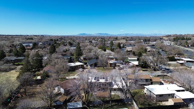 drone / aerial view with a residential view and a mountain view