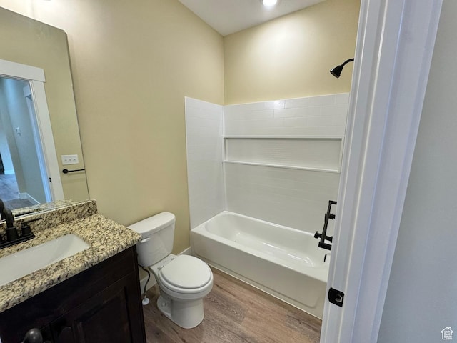 18136 N 6000 W, Garland, UT 84312 - full bathroom featuring vanity,  shower combination, toilet, and wood finished floors