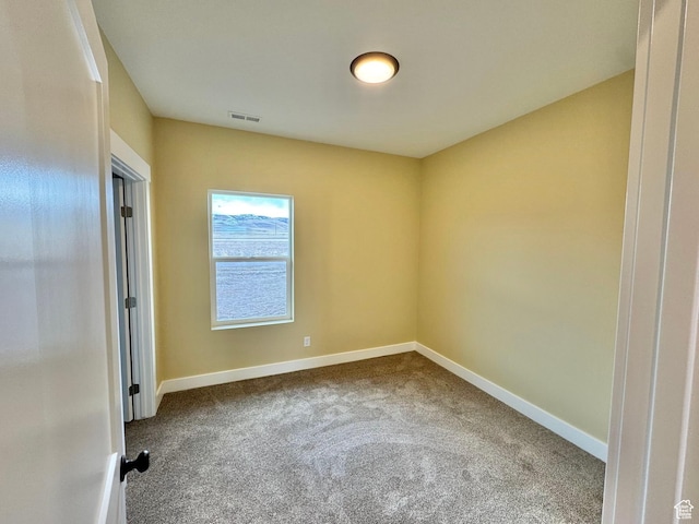 18136 N 6000 W, Garland, UT 84312 - carpeted spare room featuring visible vents and baseboards