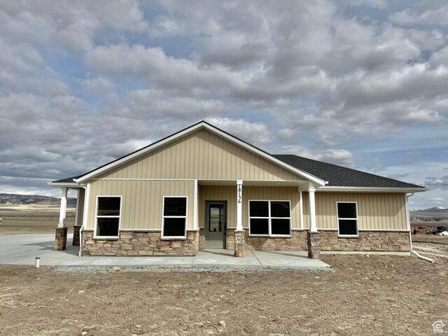 view of front of house featuring stone siding
