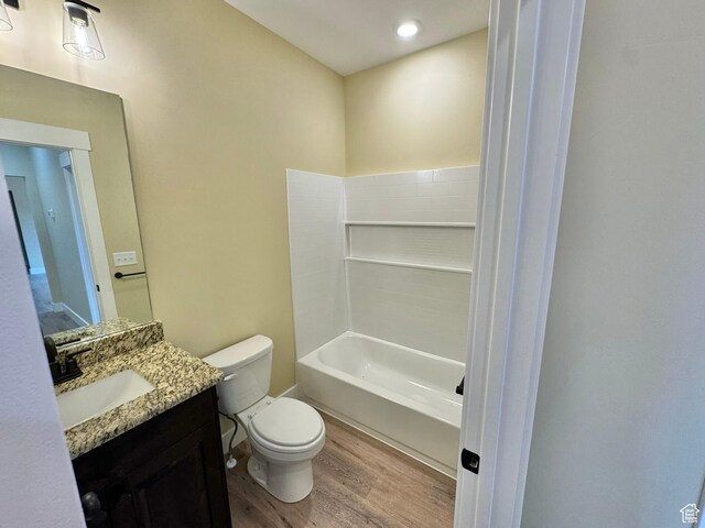 18136 N 6000 W, Garland, UT 84312 - full bathroom with toilet, vanity, and wood finished floors