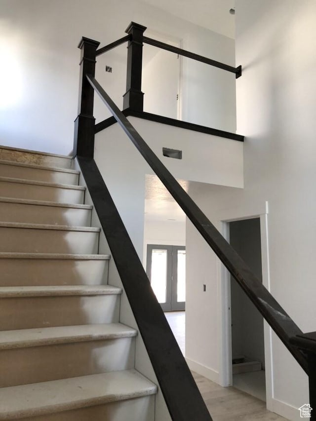 3999 W 2025 S Unit 45, Taylor, UT 84401 - stairs with a high ceiling and wood finished floors