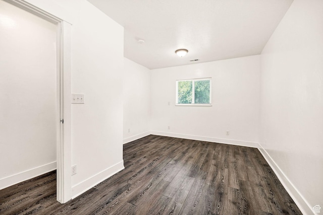 260 W 300 S, Hyrum, UT 84319 - unfurnished room with dark wood-type flooring and baseboards