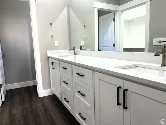 572 S 600 E Unit 2, Nephi, UT 84648 - full bath with double vanity, wood finished floors, baseboards, and a sink