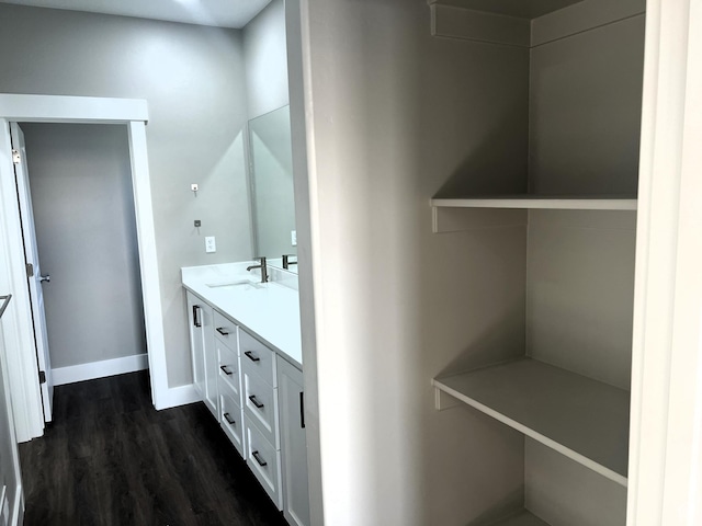 572 S 600 E Unit 2, Nephi, UT 84648 - bathroom with baseboards, wood finished floors, and vanity