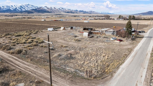 aerial view featuring a rural view and a mountain view
