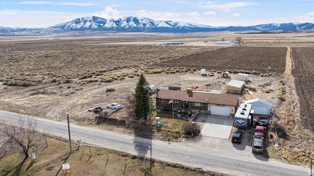 bird's eye view with a mountain view and a rural view