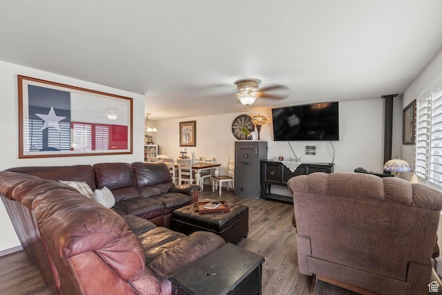 living room featuring wood finished floors and ceiling fan