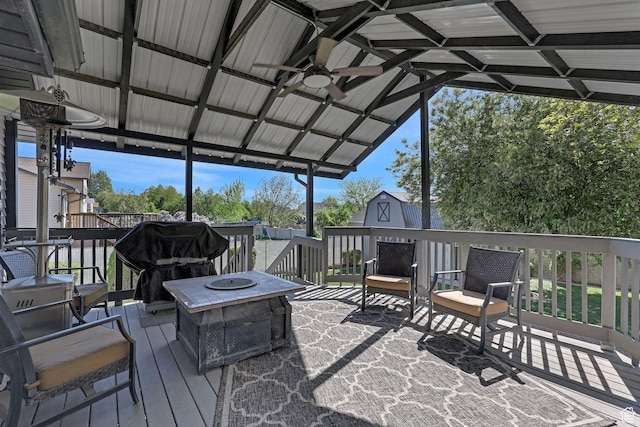 1778 Allison Way, Syracuse, UT 84075 - wooden terrace with a fire pit and an outbuilding