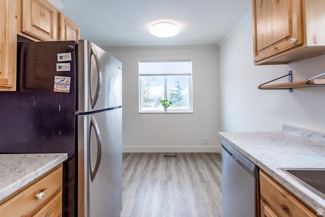 720 E 5th Ave N Unit 9, Salt Lake City, UT 84103 - kitchen with baseboards, ornamental molding, light brown cabinetry, stainless steel appliances, and light wood-type flooring