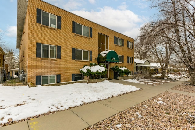 720 E 5th Ave N Unit 9, Salt Lake City, UT 84103 - view of snow covered property