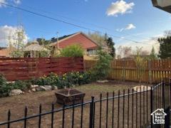 3614 Taylor Ave, Ogden, UT 84403 - view of yard featuring a fenced backyard
