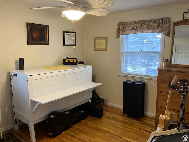 3614 Taylor Ave, Ogden, UT 84403 - misc room with baseboards, wood finished floors, and ceiling fan
