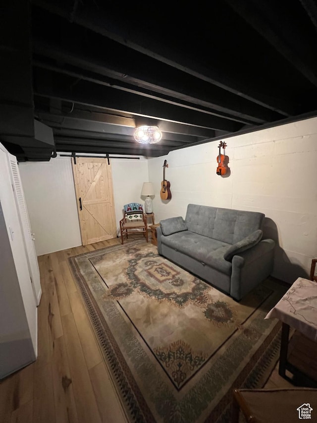 3614 Taylor Ave, Ogden, UT 84403 - living room featuring a barn door and wood-type flooring
