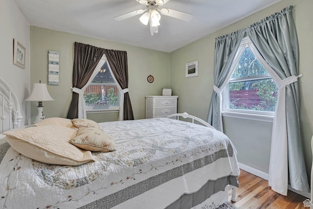 3614 Taylor Ave, Ogden, UT 84403 - bedroom featuring wood finished floors, a ceiling fan, and baseboards