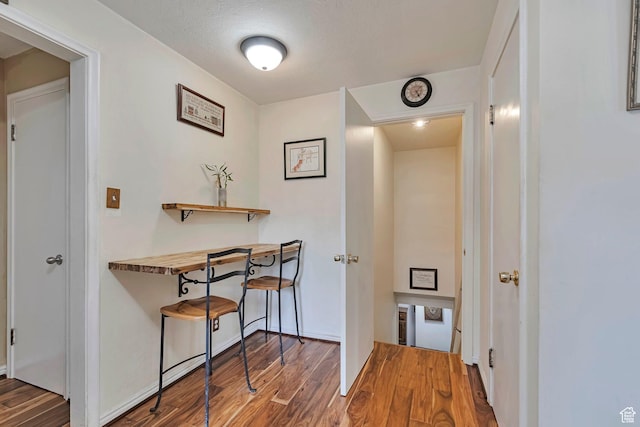 3614 Taylor Ave, Ogden, UT 84403 - corridor with wood finished floors and baseboards