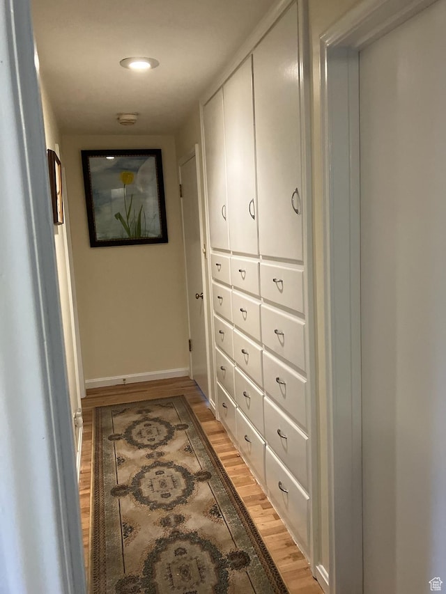 3614 Taylor Ave, Ogden, UT 84403 - corridor with light wood finished floors, baseboards, and mail area