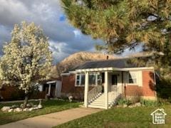 3614 Taylor Ave, Ogden, UT 84403 - view of front of property featuring a front lawn and a water view
