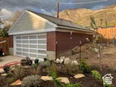 3614 Taylor Ave, Ogden, UT 84403 - view of home's exterior featuring fence, an outbuilding, and a detached garage