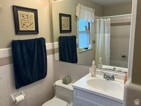 3614 Taylor Ave, Ogden, UT 84403 - bathroom featuring tile walls, a shower with curtain, vanity, and toilet