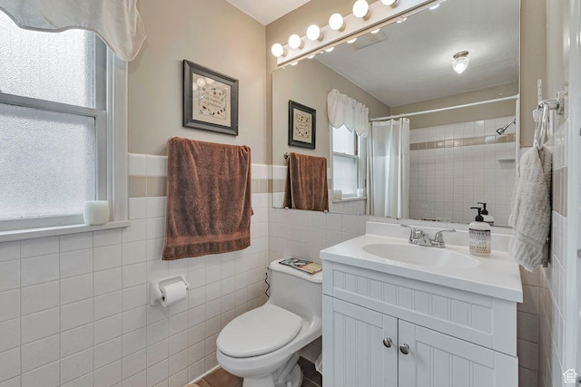 3614 Taylor Ave, Ogden, UT 84403 - bathroom featuring healthy amount of natural light, tile walls, vanity, toilet, and a shower with shower curtain