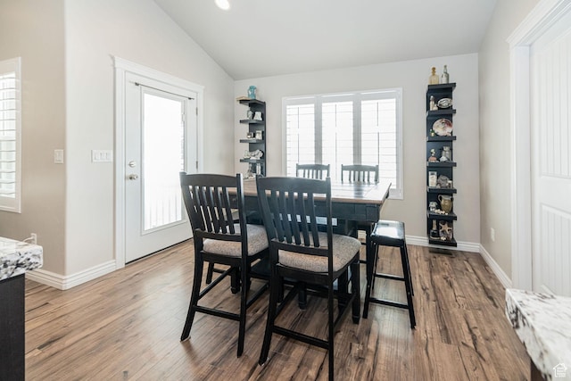 2252 W 3250 S, West Haven, UT 84401 - dining room featuring vaulted ceiling, baseboards, and wood finished floors