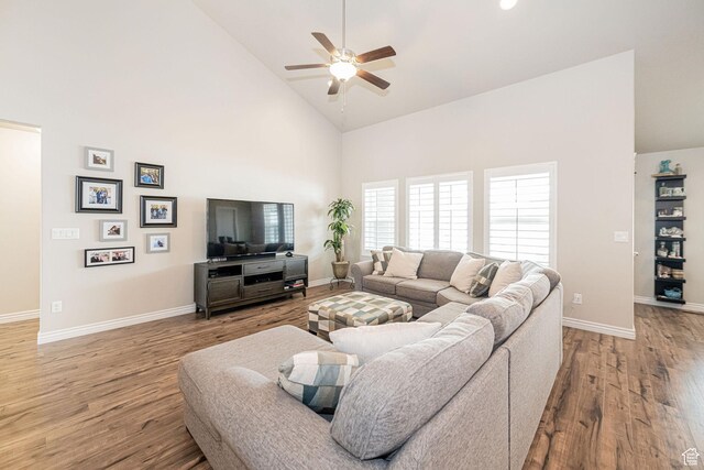 2252 W 3250 S, West Haven, UT 84401 - living room featuring a ceiling fan, baseboards, high vaulted ceiling, and light wood-style flooring