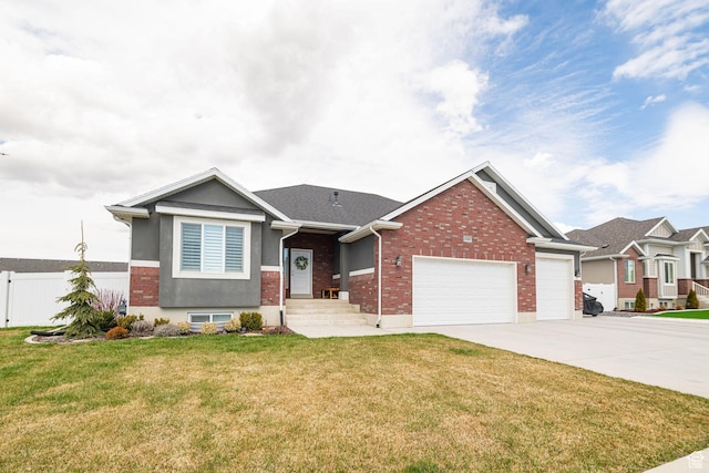 2252 W 3250 S, West Haven, UT 84401 - view of front of home with a garage, concrete driveway, fence, a front yard, and brick siding