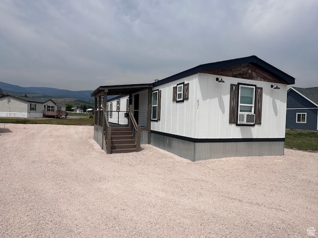 631 S Maple Dr, Garden City, UT 84028 - manufactured / mobile home with cooling unit and a mountain view