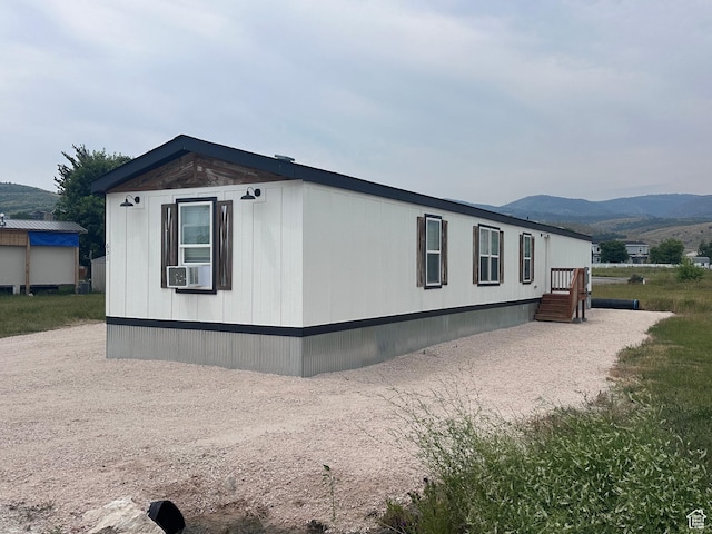 631 S Maple Dr, Garden City, UT 84028 - view of side of home with a mountain view