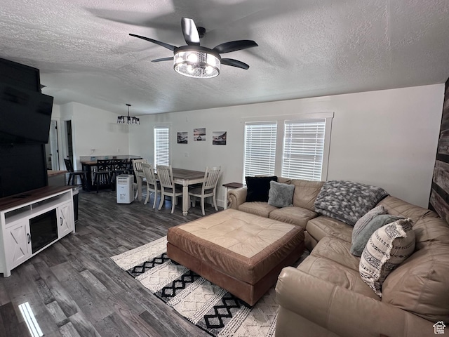 631 S Maple Dr, Garden City, UT 84028 - living area featuring wood finished floors, a textured ceiling, and ceiling fan