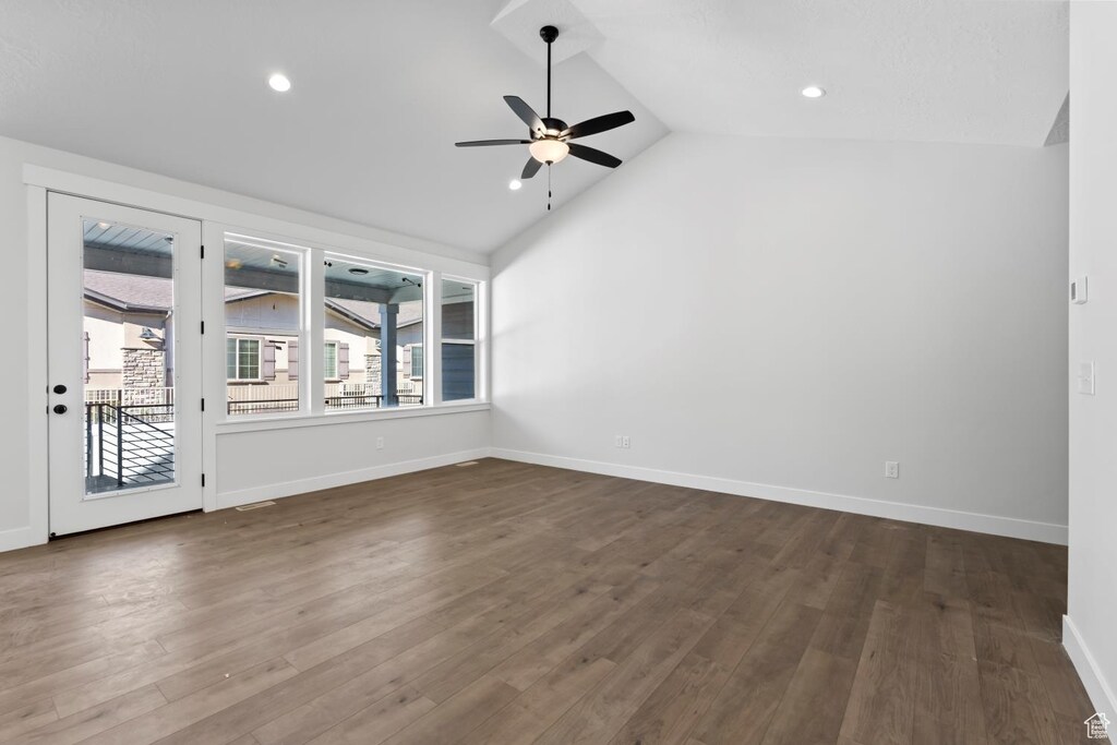 5336 S Murray Rd Unit 115, Murray, UT 84123 - interior space featuring dark wood-style floors, baseboards, lofted ceiling, and ceiling fan