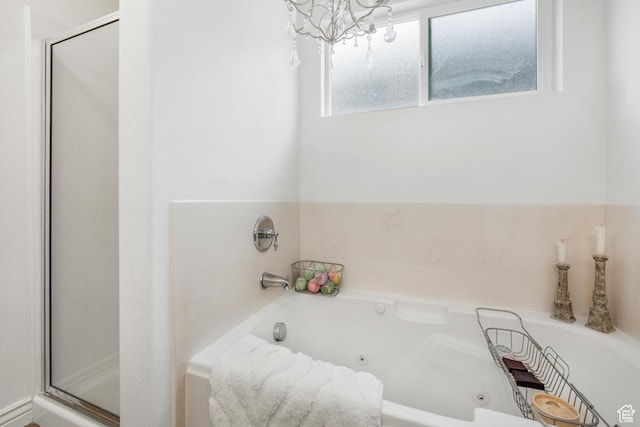 10358 N Tamarack Way E, Cedar Hills, UT 84062 - bathroom featuring a whirlpool tub, a shower stall, and a chandelier