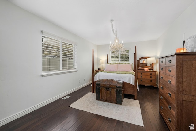 10358 N Tamarack Way E, Cedar Hills, UT 84062 - bedroom with a chandelier and dark wood-type flooring