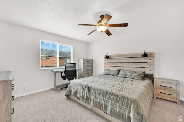 462 W 1490 N Unit 102, Logan, UT 84341 - carpeted bedroom featuring baseboards and a ceiling fan