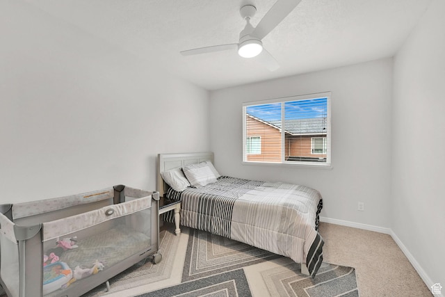 462 W 1490 N Unit 102, Logan, UT 84341 - bedroom with carpet, baseboards, and ceiling fan