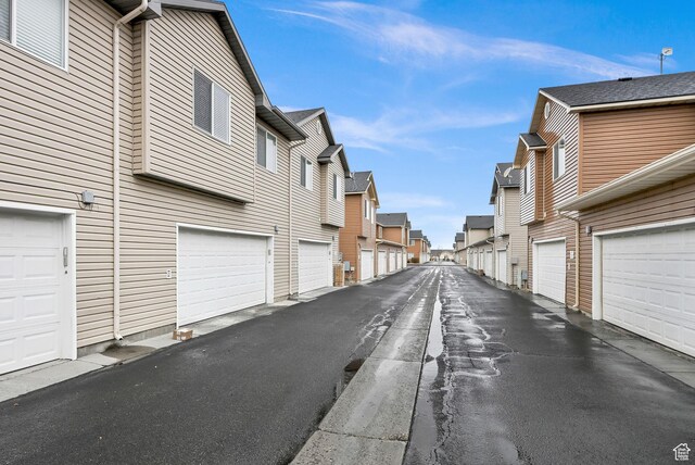 462 W 1490 N Unit 102, Logan, UT 84341 - view of asphalt road with a residential view and community garages