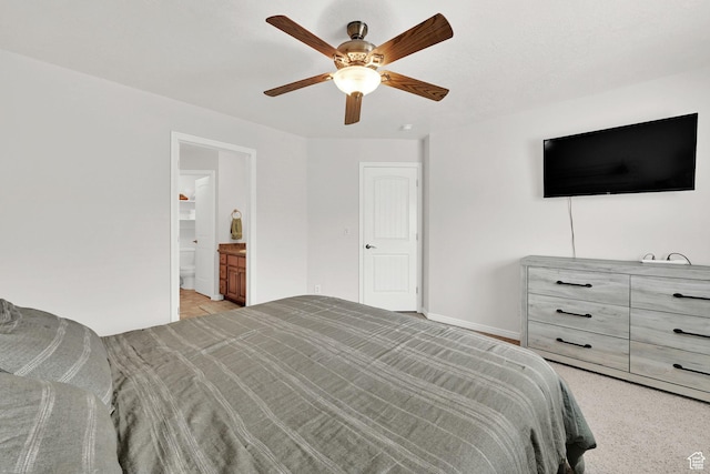 462 W 1490 N Unit 102, Logan, UT 84341 - bedroom featuring baseboards, a ceiling fan, and ensuite bath