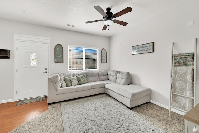 462 W 1490 N Unit 102, Logan, UT 84341 - living area with ceiling fan, baseboards, and wood finished floors