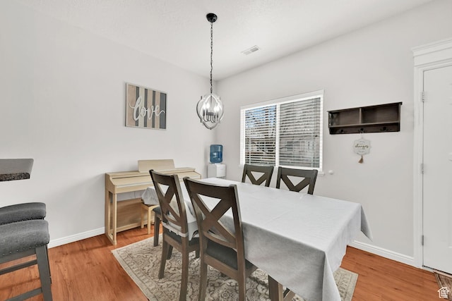 462 W 1490 N Unit 102, Logan, UT 84341 - dining space featuring baseboards and wood finished floors