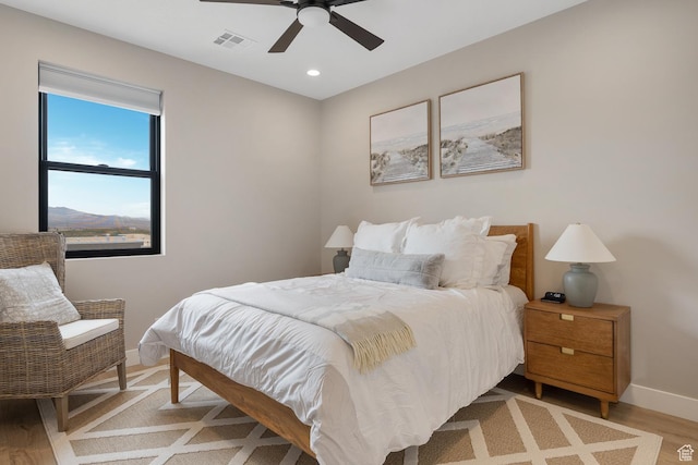 5401 S Aquamarine Ln E, St George, UT 84790 - bedroom featuring baseboards, visible vents, light wood-style flooring, recessed lighting, and ceiling fan