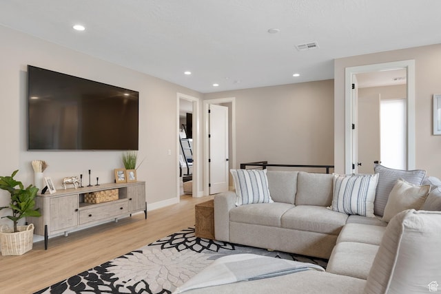 5401 S Aquamarine Ln E, St George, UT 84790 - living area featuring recessed lighting, visible vents, baseboards, and light wood-style flooring