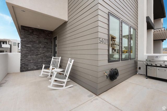 5401 S Aquamarine Ln E, St George, UT 84790 - view of patio featuring area for grilling