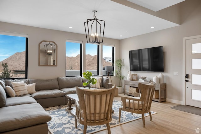 5401 S Aquamarine Ln E, St George, UT 84790 - living area featuring recessed lighting, a mountain view, light wood-style floors, baseboards, and a chandelier