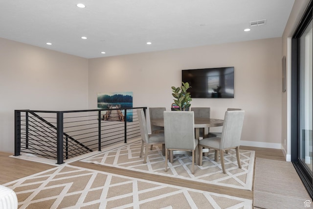 5401 S Aquamarine Ln E, St George, UT 84790 - dining area featuring wood finished floors, recessed lighting, visible vents, and baseboards